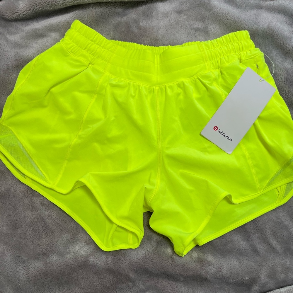 Lululemon Hotty Hot LR Short 4” Lined. Size 8 Tall in color bright yellow.